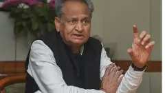 Dont be distracted by politics, focus on helping people: Gehlot to Congress workers